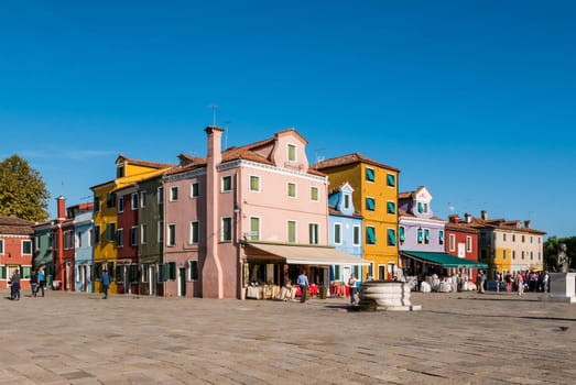 BURANO, ITALY CIRCA SEPTEMBER 2015: Burano is an island in the Venice lagoon known for its typical brightly colored houses and the centuries-old craftsmanship needle lace of Burano.