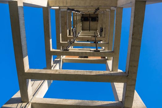 Historic hoist tower of the former "President" mine shaft in Chorzow, Silesia region, Poland, viewed from below. The mine shaft was in use until 1933.