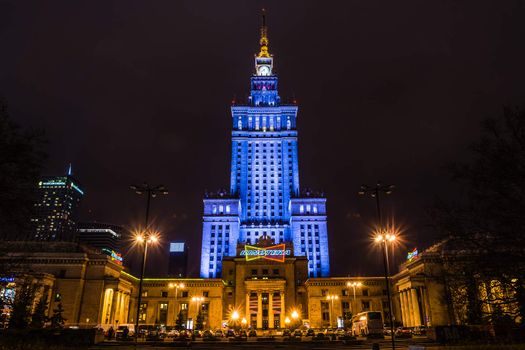 Palace of Culture and Science built in socialism realism style as a gift for Poland from USSR in 1955 surrounded by modern skyscrapers on December 29, 2013.