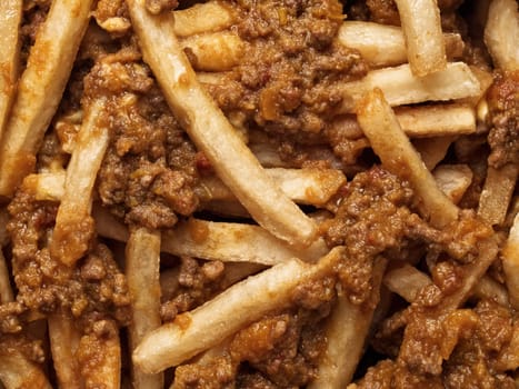 close up of rustic american chili fries food background