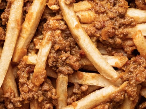 close up of rustic american chili fries food background