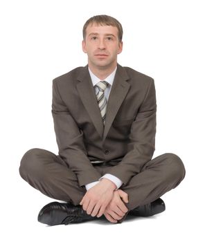 Businessman sitting in lotus posture on isolated white background