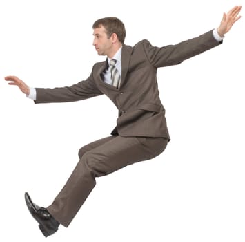 Businessman sitting on empty space on isolated white background