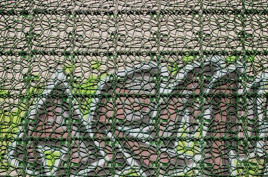 the murals trapped by a wire mesh