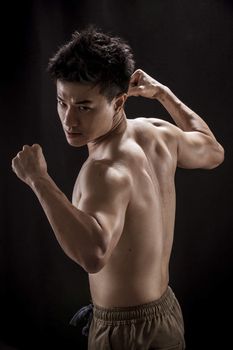 Topless portrait of Asian young man - Fighter concept, Muaythai, boxing