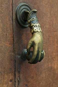 Door handle woman's hand, taken in Gras, France