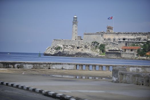 Havana, Cuba, - August 2013. Havana Harbor is the port of Havana, the capital of Cuba, and it is the main port in Cuba. Across the bay the castle of Morro can be seen.