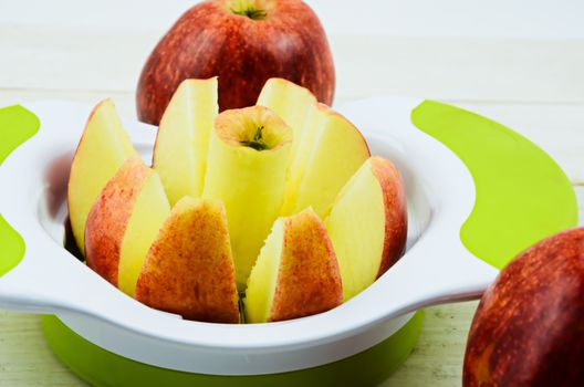 Apple cutter, apple slicer on white board
