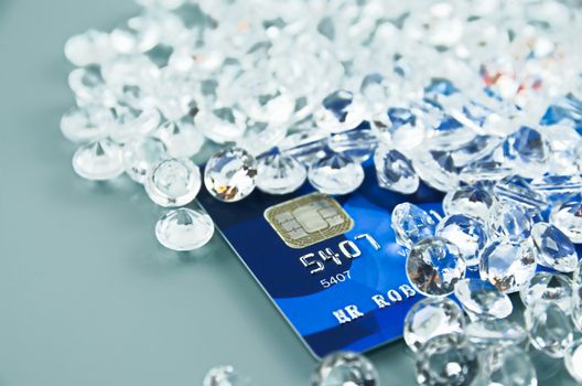 Credit cards closeup with cover by diamonds
