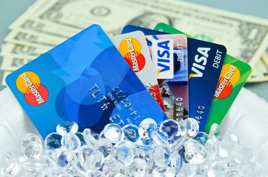 Credit cards closeup with money, diamonds and dollars, shallow dof
