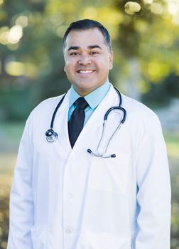 Smiling Handsome Hispanic Male Doctor Portrait Outdoors.