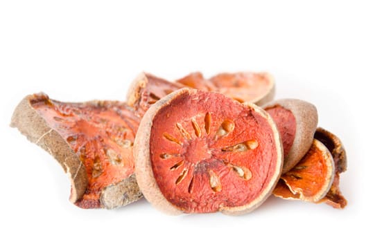 Dry Bael Fruit tea (Aegle marmelos) isolated on white background