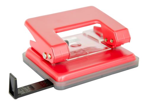 Red office paper hole puncher on white background