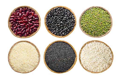 set of cereals seeds beans, red beans, black beans, green beans, sesame, black sesame, barley grit, in weave basket on white background.