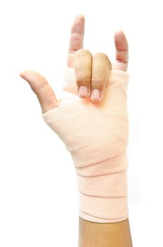 Injured male hand wrapped with bandage on white background.