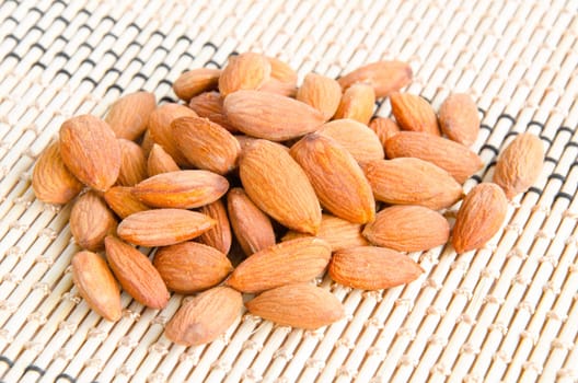 almonds on wooden mat