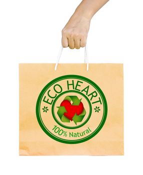 man holding a shopping recycle bag isolated on white background. clipping path. ECO HEART 100% natural.