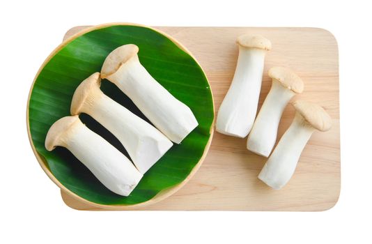 King Oyster mushroom and leaf on wood background. Eringi