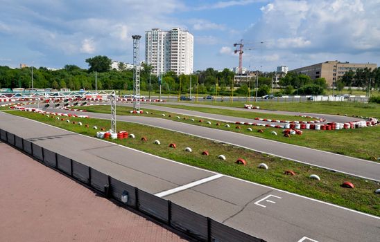 outdoor winding asphalt karting track in city boundaries