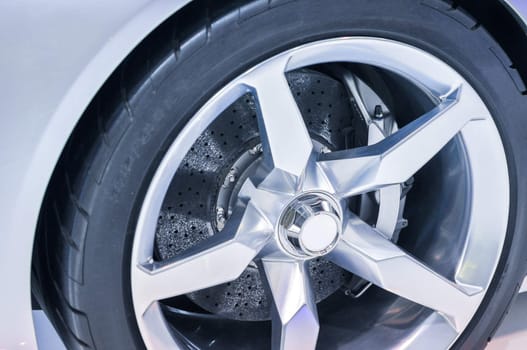 the wheel of a modern sports car