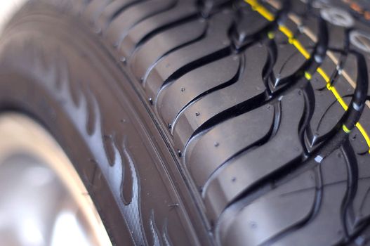 Low-profile car wheel on a white background close