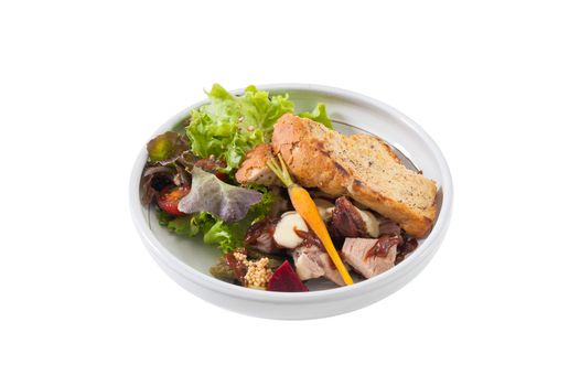 Modern style salad with garlic toast and grilled pork with barbecue sauce