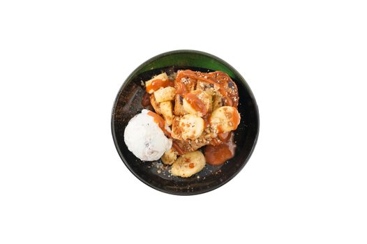 Ice cream and toast with banana and Thai tea ceramel sauce isolated on white background with clipping path