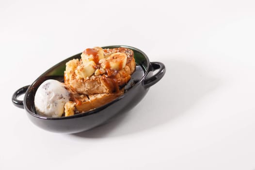 Ice cream and toast with banana and Thai tea ceramel sauce
