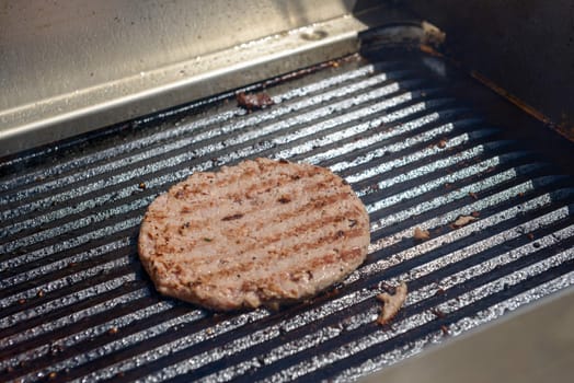 succulent grilled steak on a hot grill