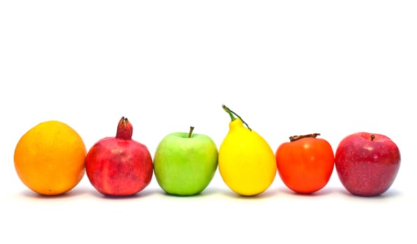 fruits in a row on a white background