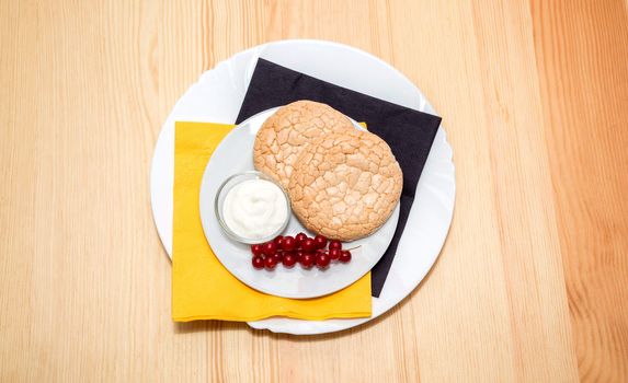 still life: biscuits on a plate on wooden table