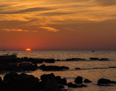 gorgeous sunset on the rocky coast of the Adriatic