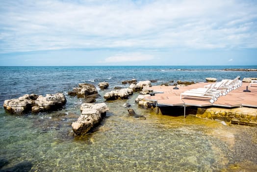 loungers on the rocky beaches of the Adriatic