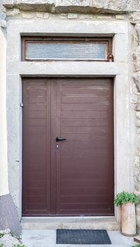 the double wing brown wood front door 