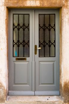 the double wing gray wood front door 