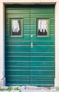 the double wing green wood front door 