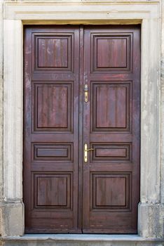 the double wing brown wood front door 