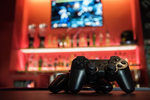 Video games at bar counter