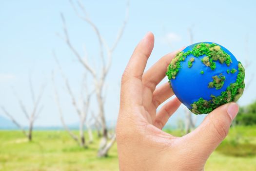 Hands and Earth. Concept Save green planet.