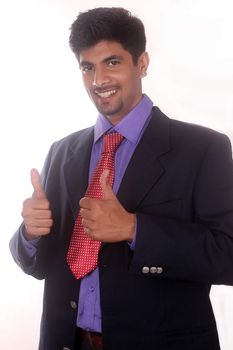 business man showing thumbs up gesture on white








Smiling businessman with thumb up