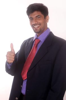 business man showing thumbs up gesture on white