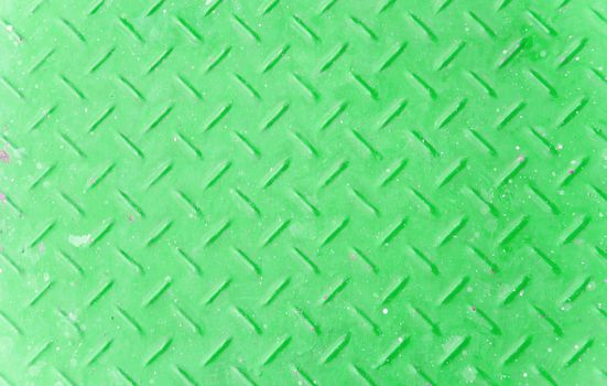 Background of old green color metal diamond plate.
