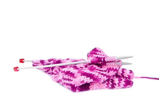 knitting yarn and knitting needles.