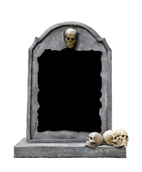Tombstone with skull isolated on white background, copy space and clipping path.