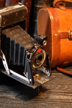 Old film camera closeup on dark background