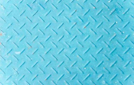 Background of old blue color metal diamond plate.