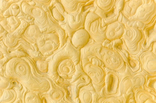 Surface of yellow stone background