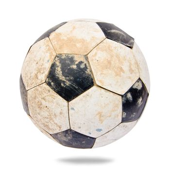 old leather soccer ball isolated on white