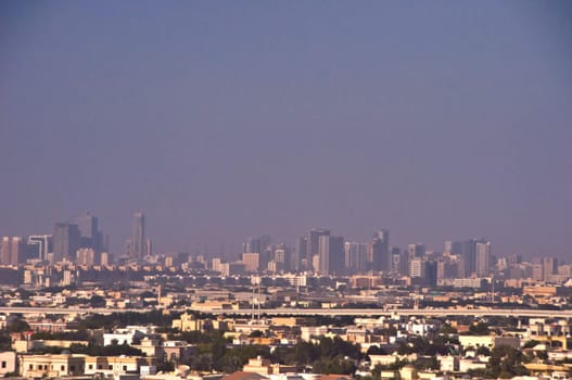 Skyline of Dubai , UAE, smog over the city