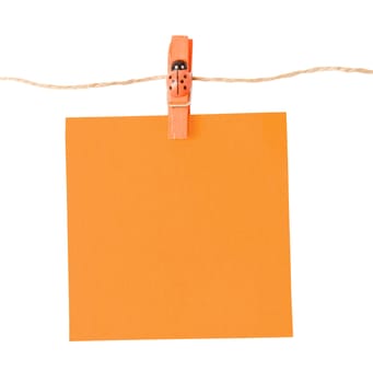 Pinned orange notepad isolated on white background, clipping path